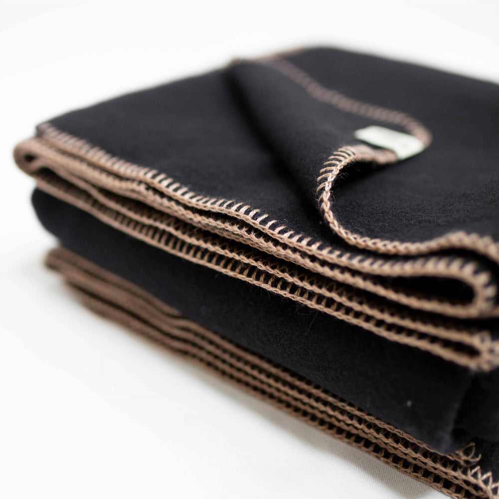 
                      
                        The Portia Throw - Cashmere Blend in Champagne
                      
                    