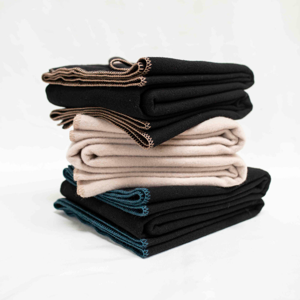 
                      
                        The Portia Throw - Cashmere Blend in Champagne
                      
                    