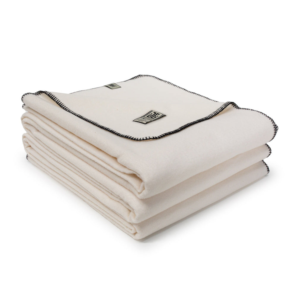 
                      
                        The JG Classic Blanket - White
                      
                    